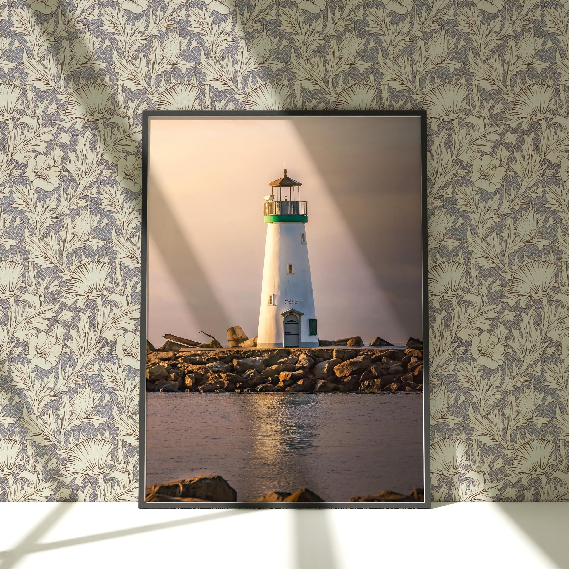 a picture of a lighthouse on a wall