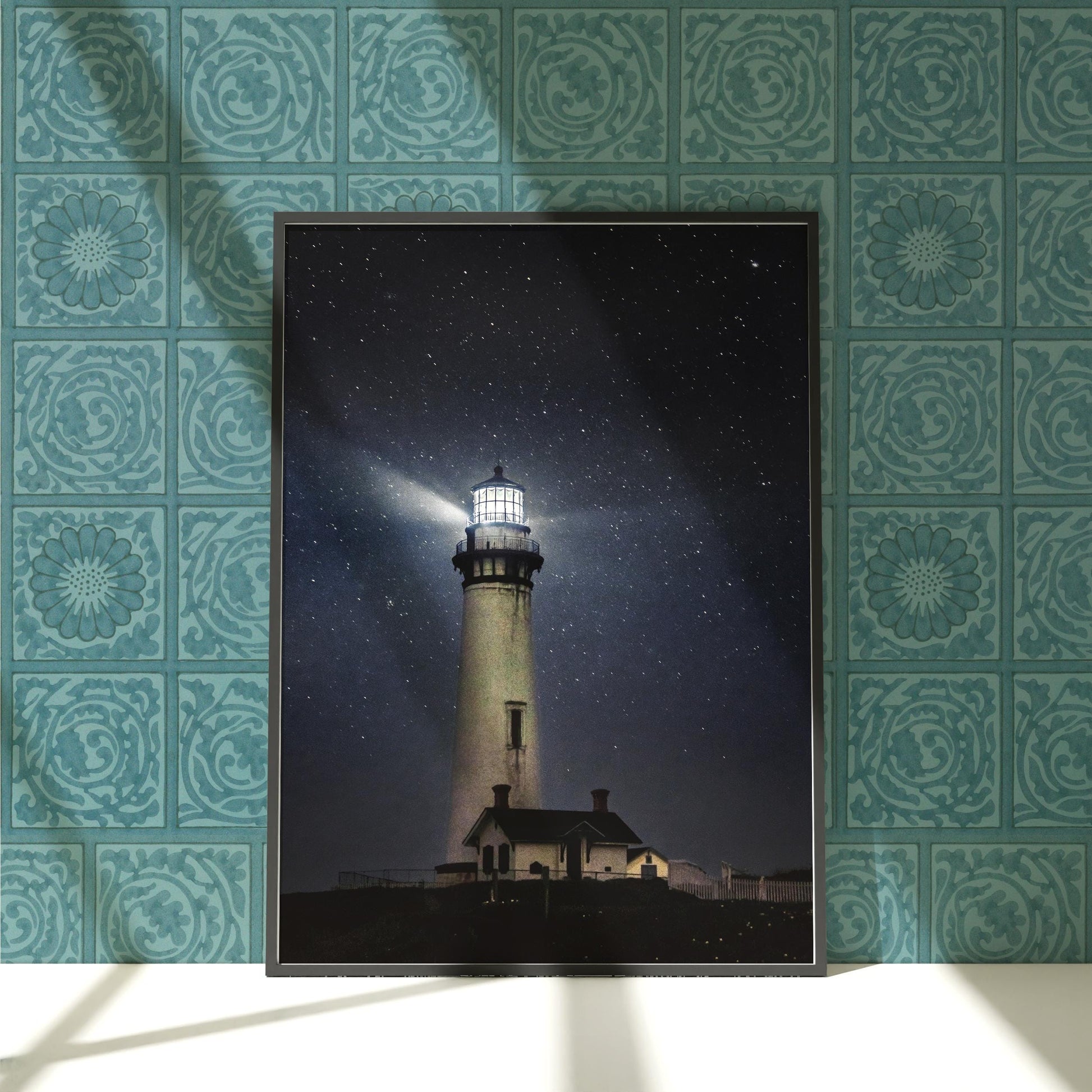 a picture of a lighthouse on a wall