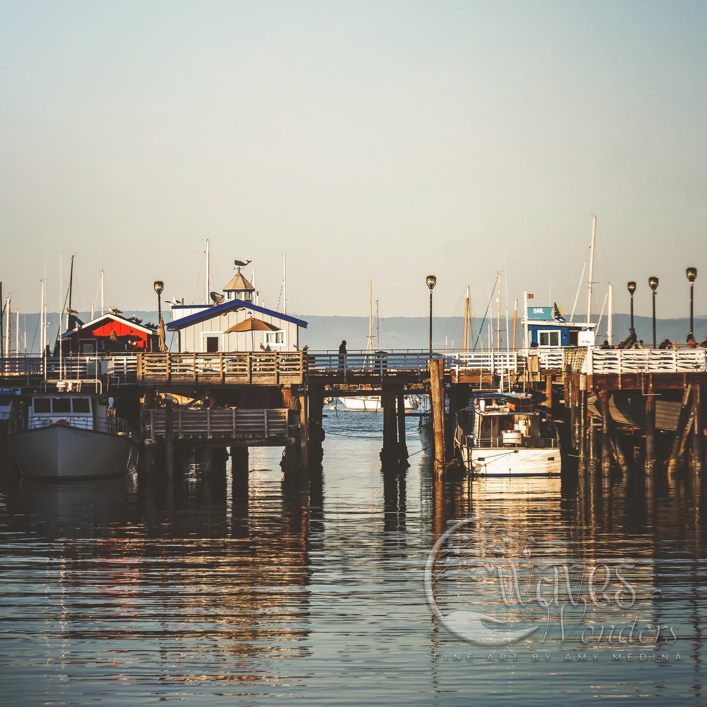 a group of boats that are sitting in the water