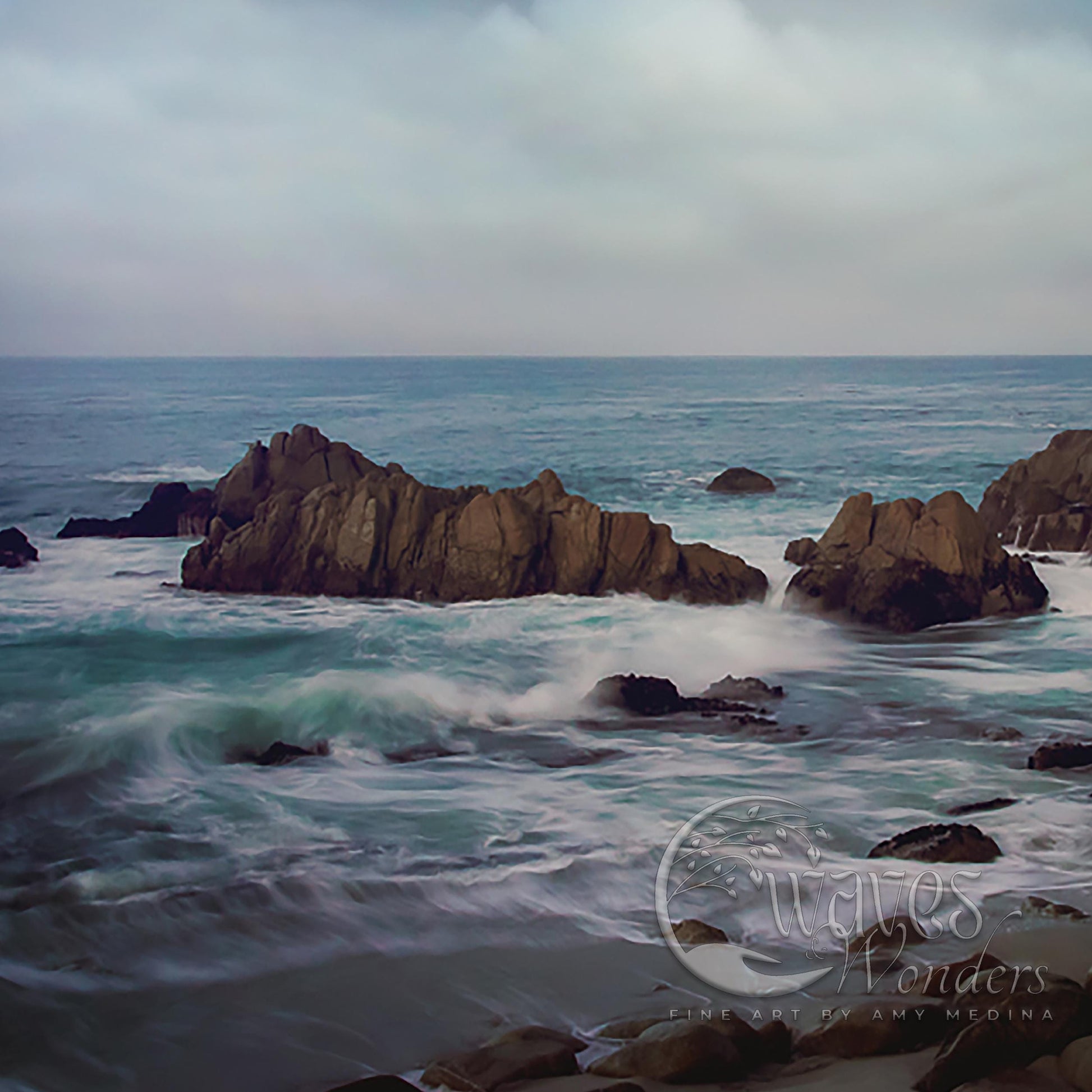 a large body of water surrounded by rocks