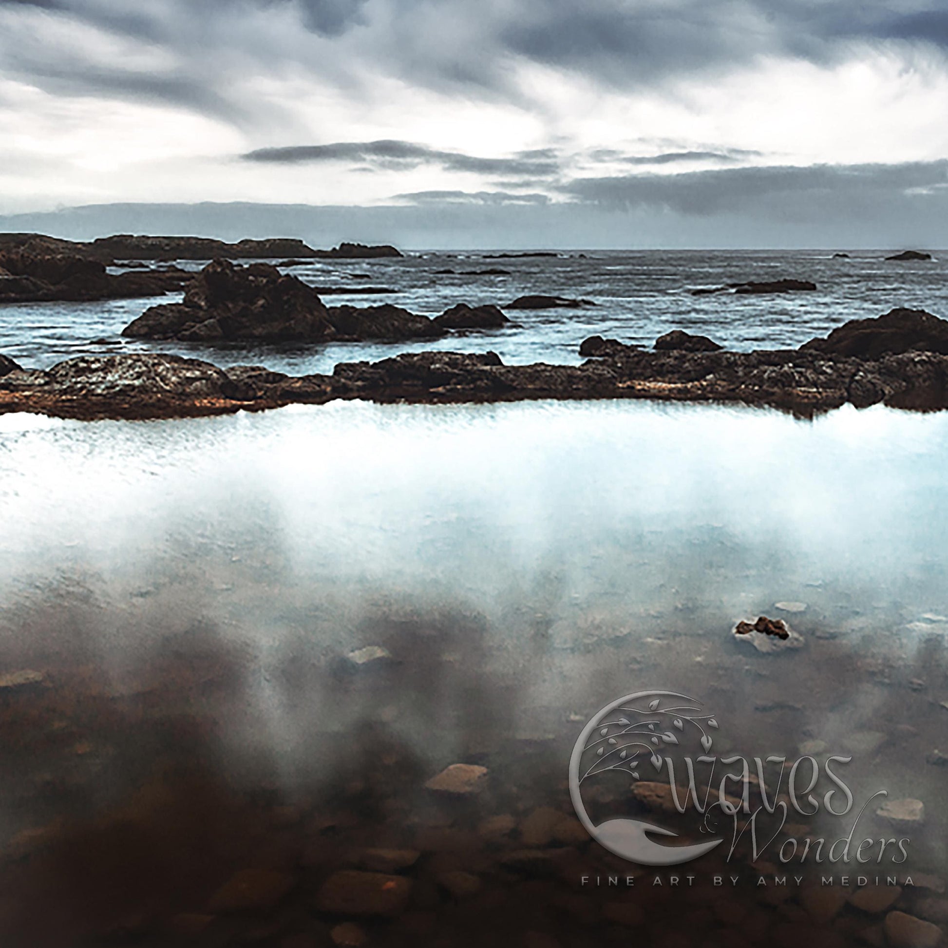 a large body of water surrounded by rocks