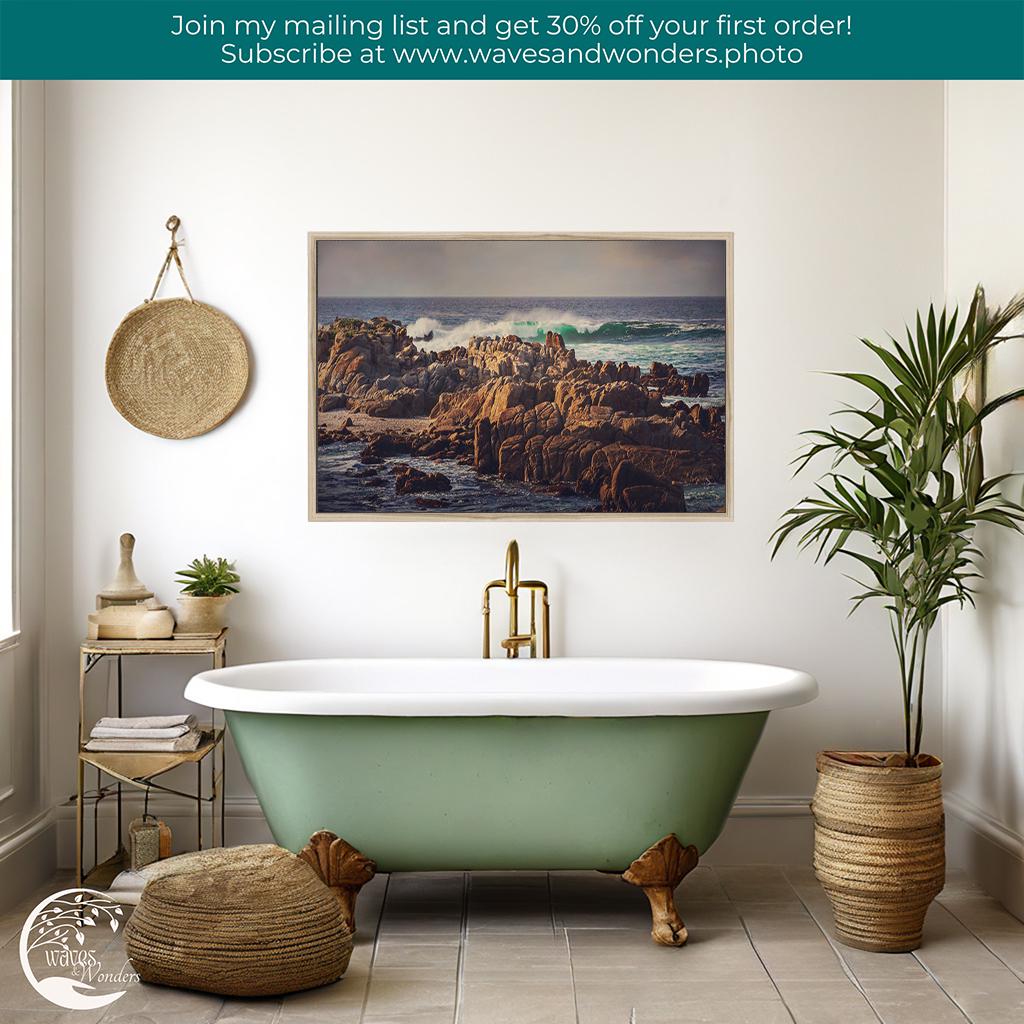 a bathroom with a claw foot tub and a painting on the wall