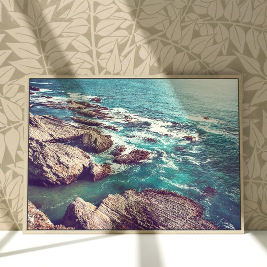 a picture of a picture of the ocean and rocks