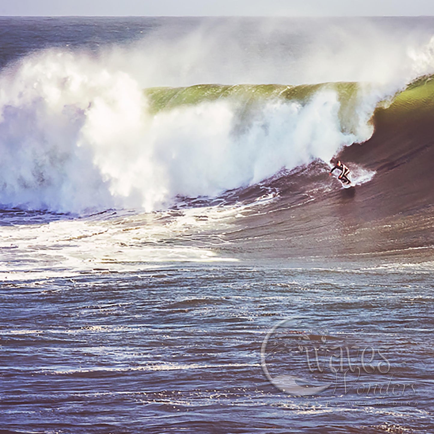 a man riding a wave on top of a surfboard