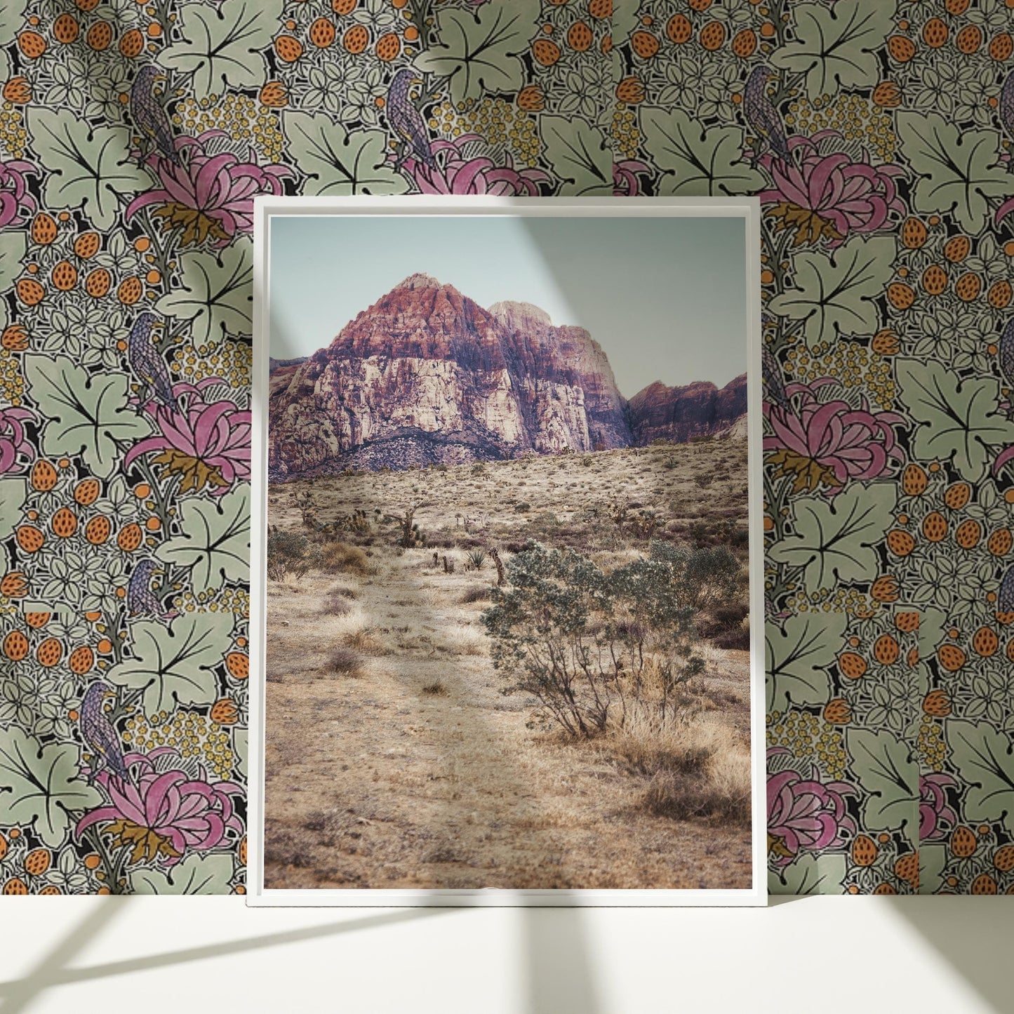 a picture of a desert with a mountain in the background