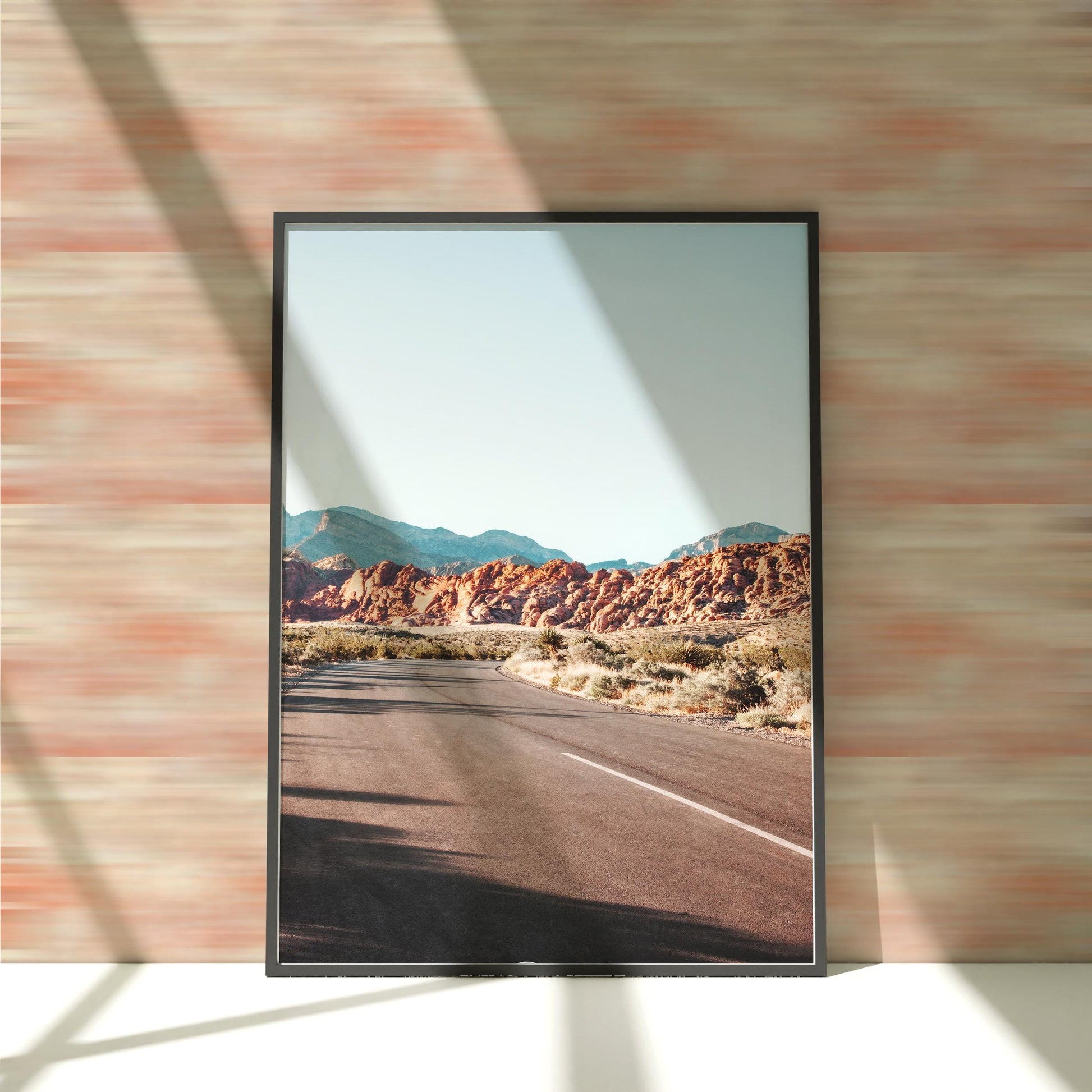 a picture of a desert with mountains in the background