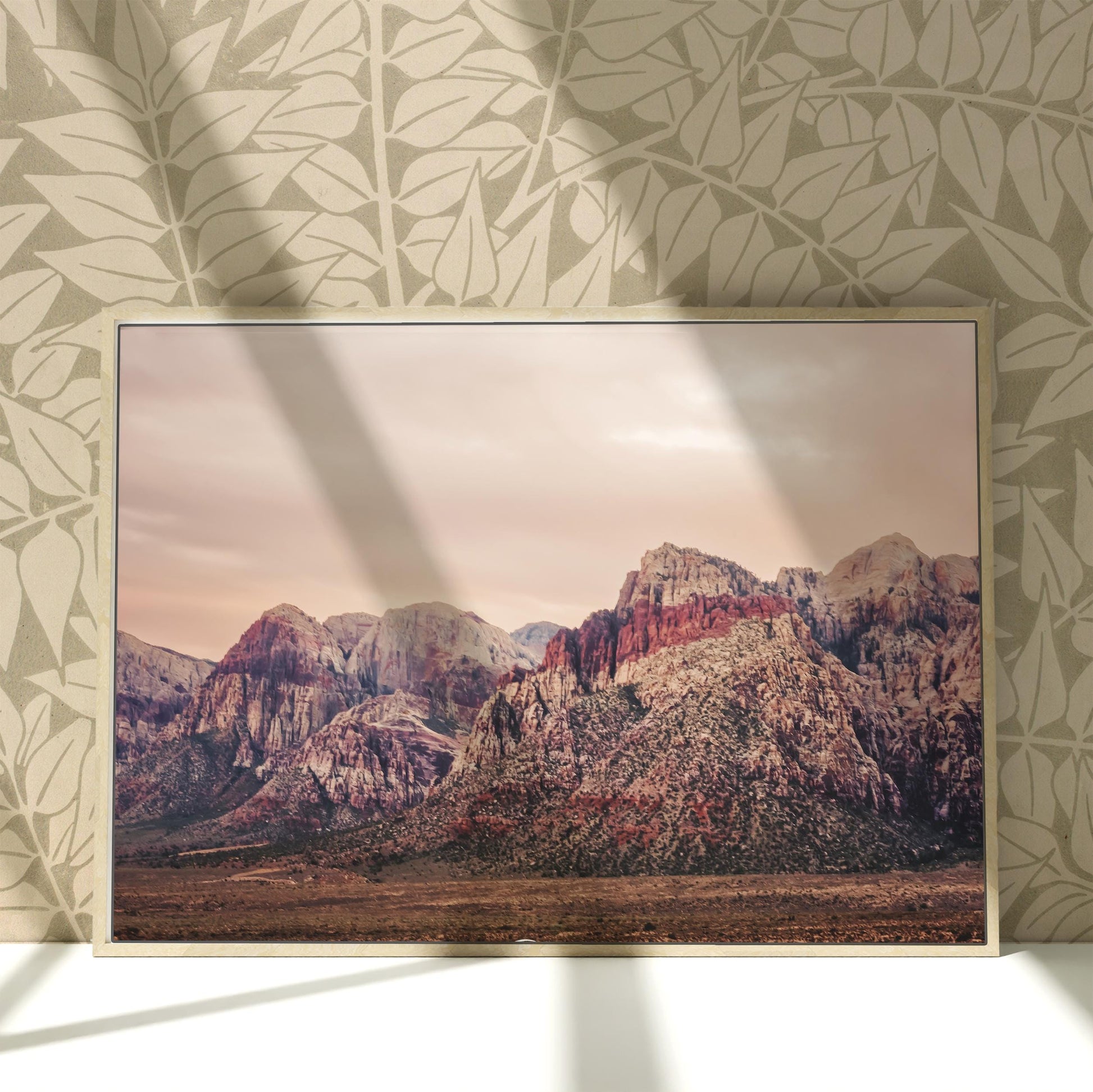 a picture of a mountain range in a frame