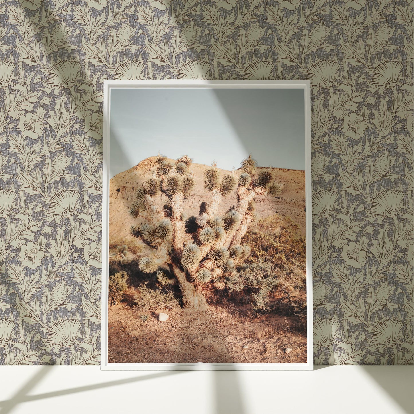 a picture of a cactus on a wall