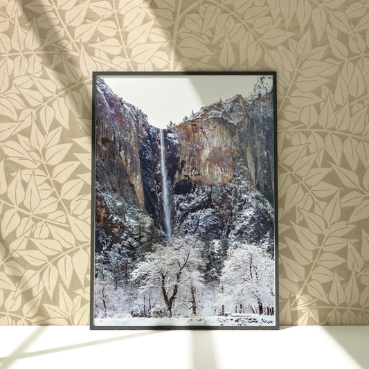 a picture of a waterfall in the mountains