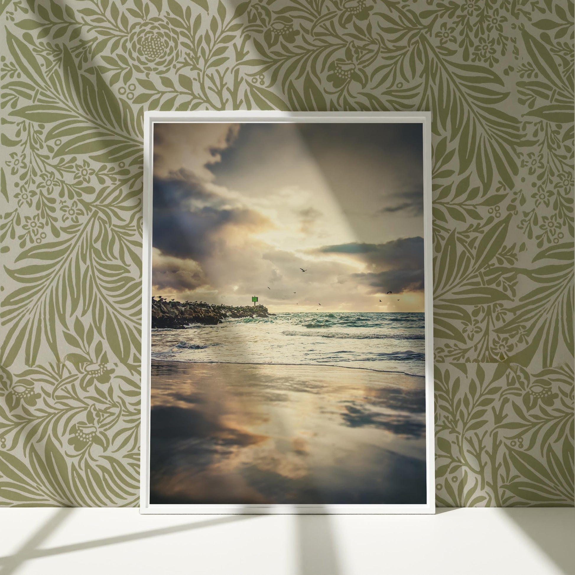 a picture of a beach with a sky and clouds in the background