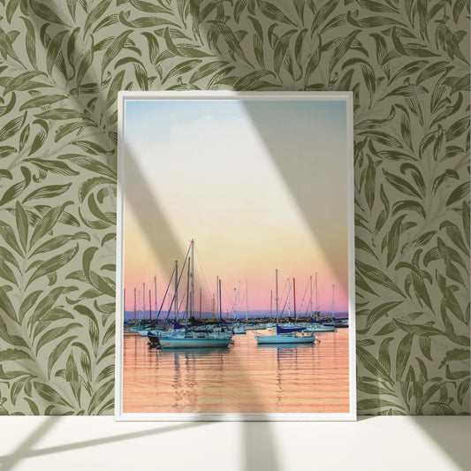 a painting of sailboats floating in a body of water