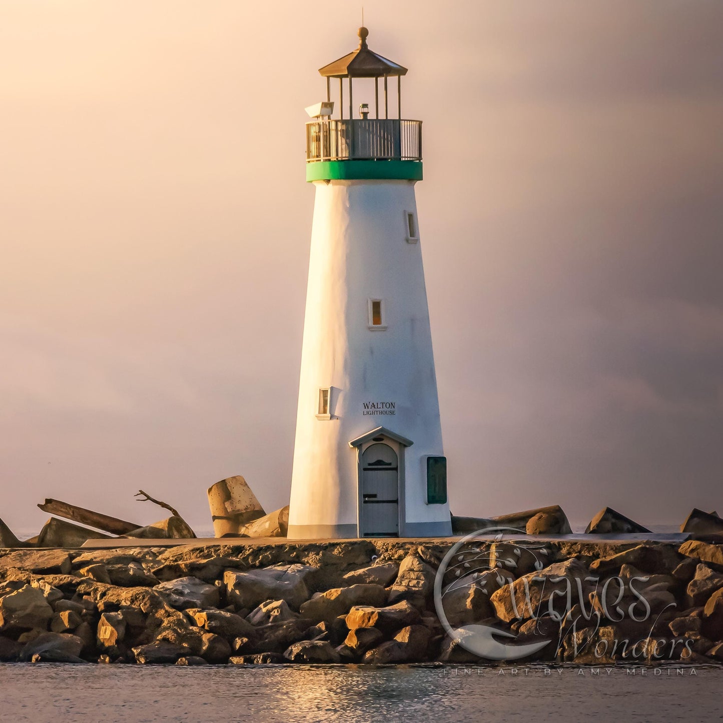 a light house sitting on top of a rocky shore