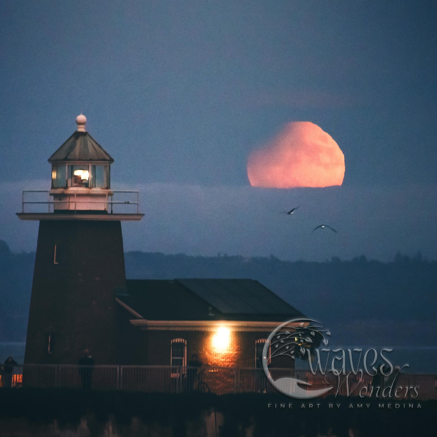 a lighthouse with a full moon in the background